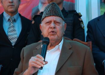 Farooq Abdullah addressing reporters at National Conference headquarters